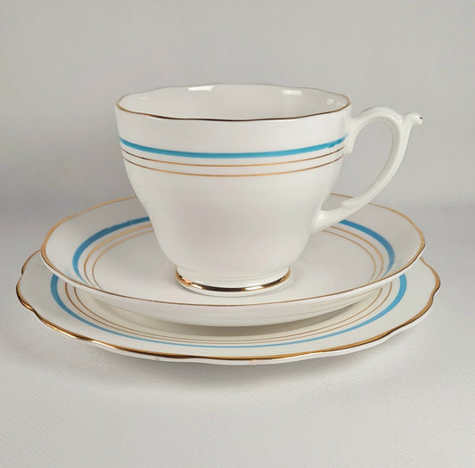 7 tea trio + lattiera + zuccheriera + piatto torta - Roslyn China