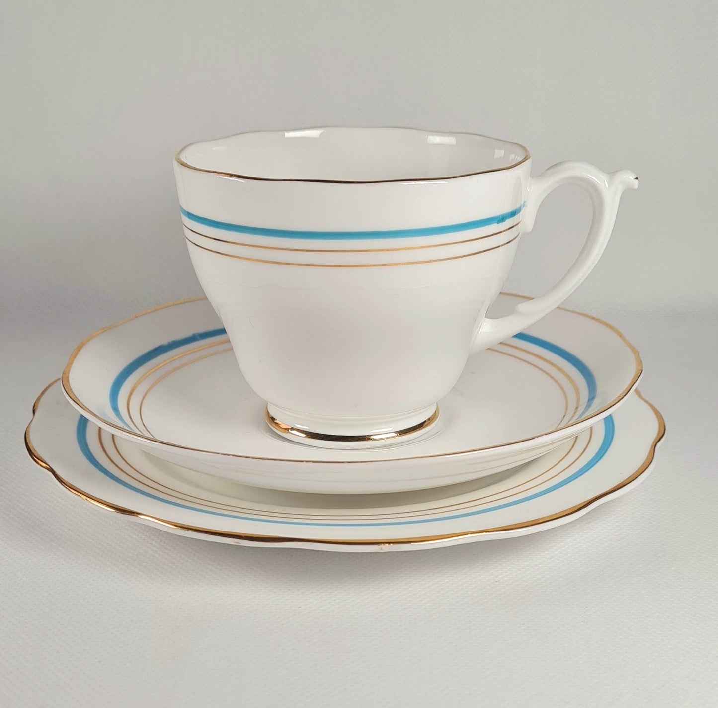 7 tea trio + lattiera + zuccheriera + piatto torta - Roslyn China